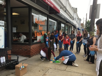 students painting in front of Anita Maries